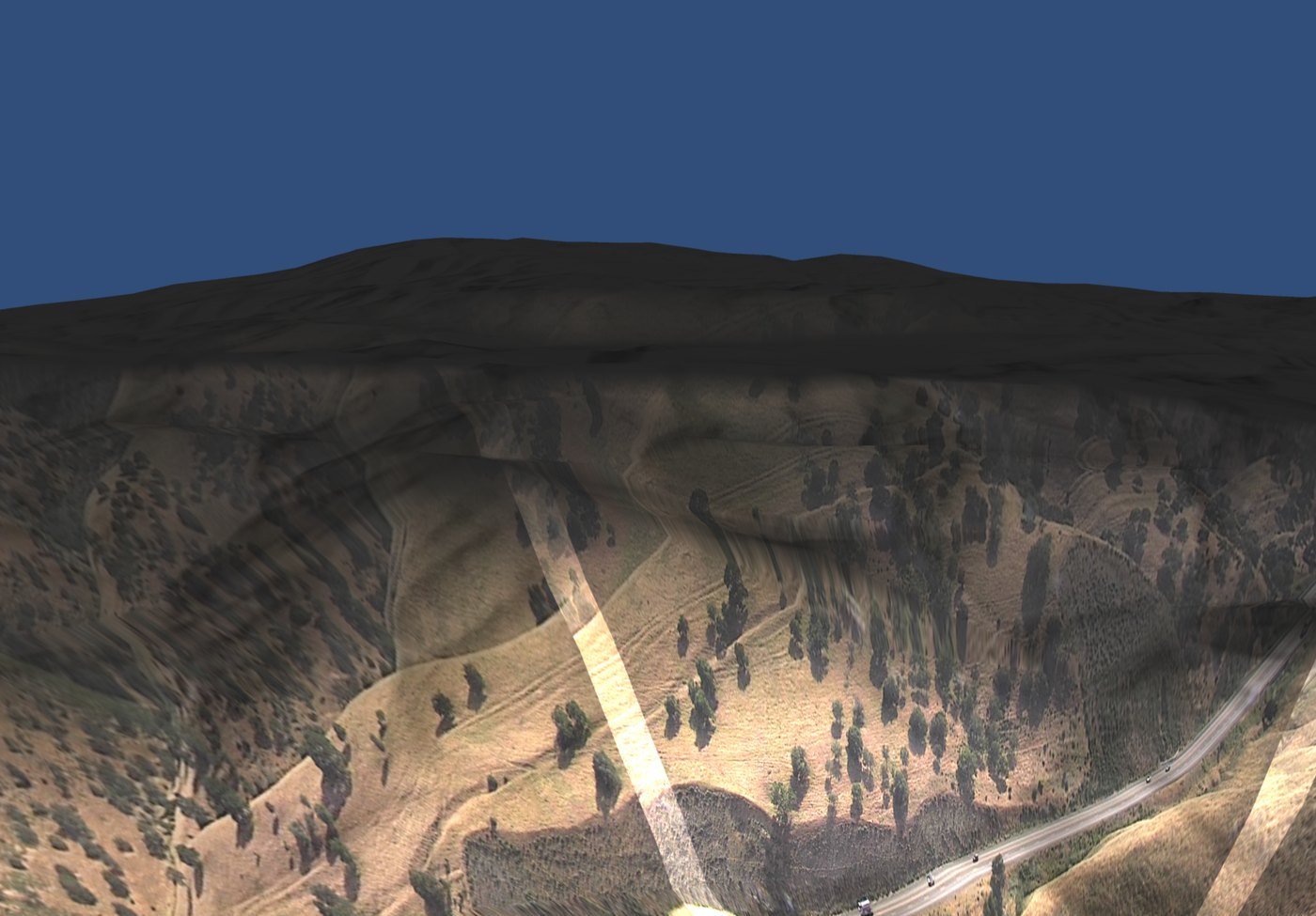 EGL-I&trade; rendering a live 3D contextual view of real terrain with camera fields-of-view and road traffic, integrating Wildfire Alert camera feeds